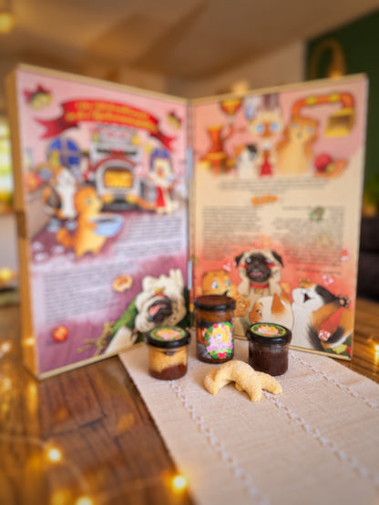Adventskalender der aussieht wie ein Buch,  aufgeschlagen aufgestellt mit schöner Katzengeschichte und Illustration